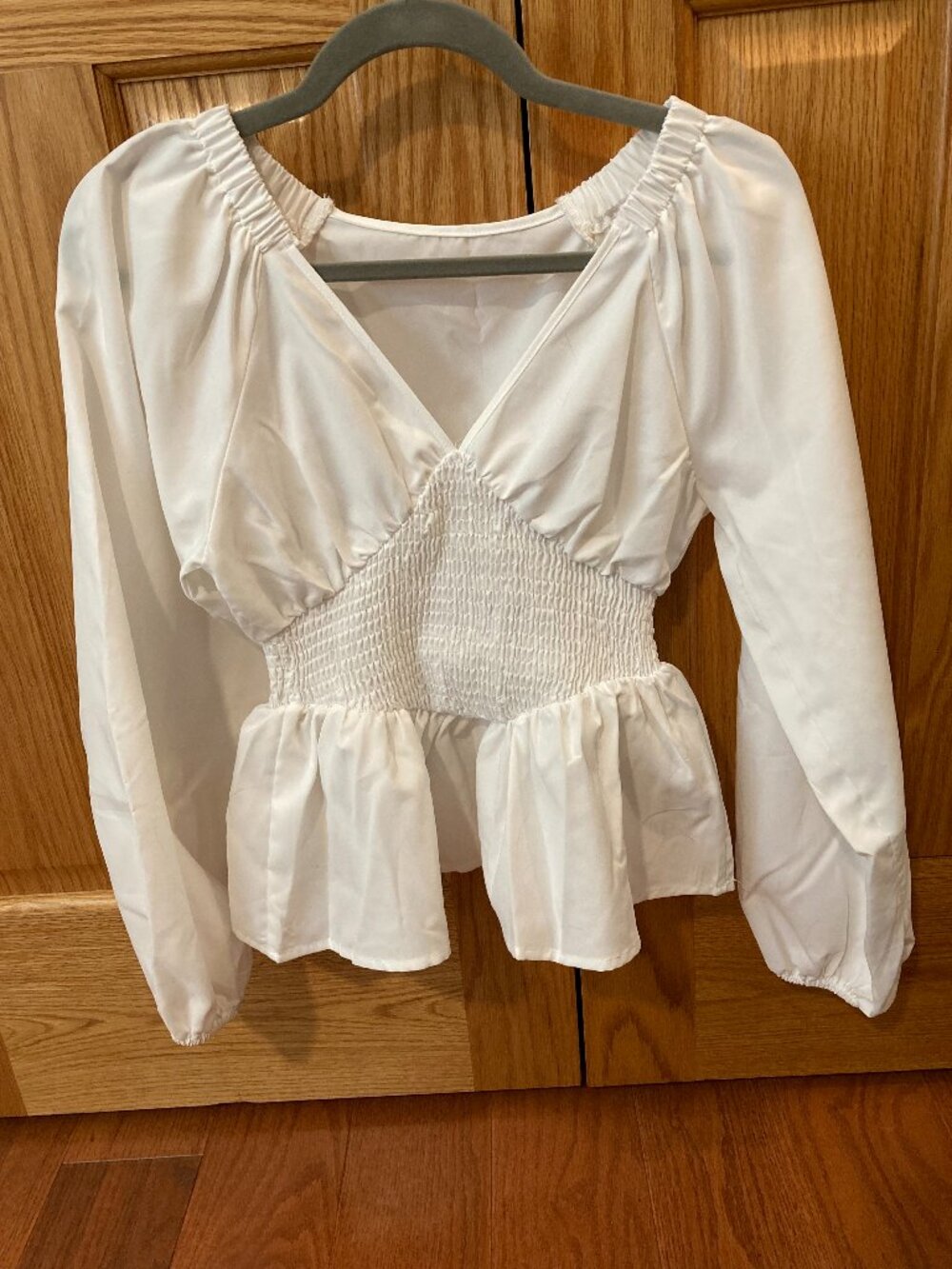 White Cinched Waist Peplum top